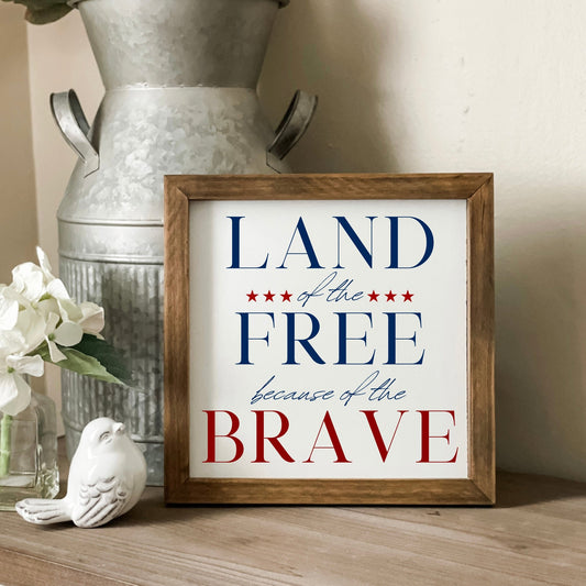 Land of the free because of the brave sign. Patriotic wall decor.