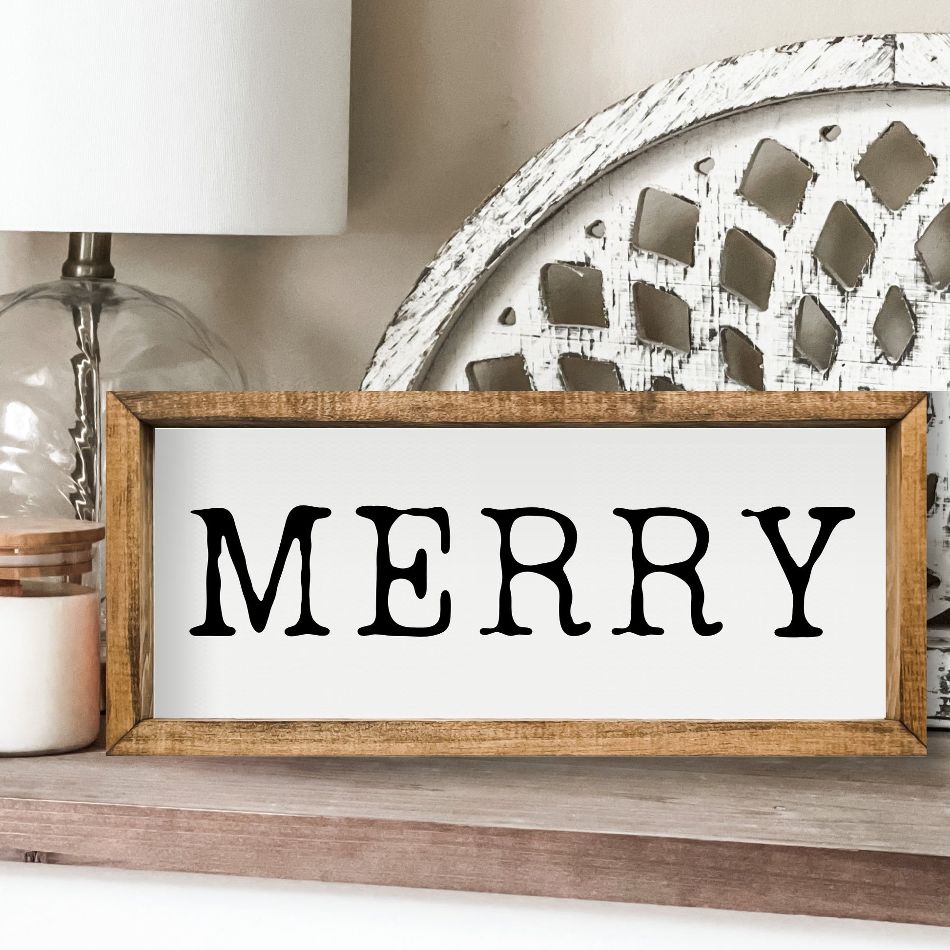 White and black MERRY sign.