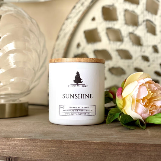 Sunshine candle. An organic soy wax candle that smells like sunshine! Amazingly bright and uplifting.