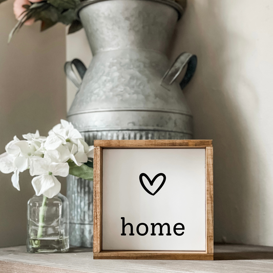 Home sign with heart.