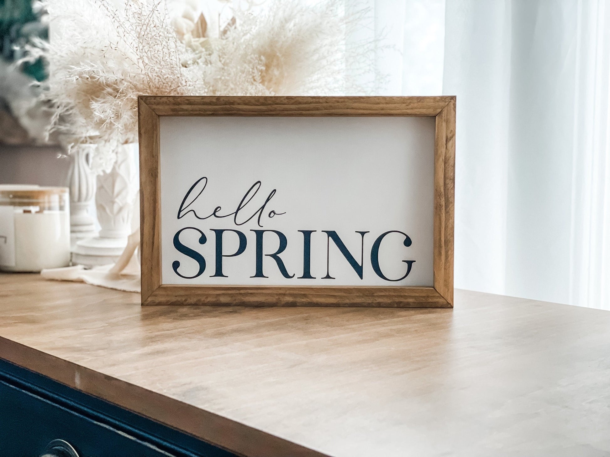 Hello spring sign in white with black font. Spring wall decor.