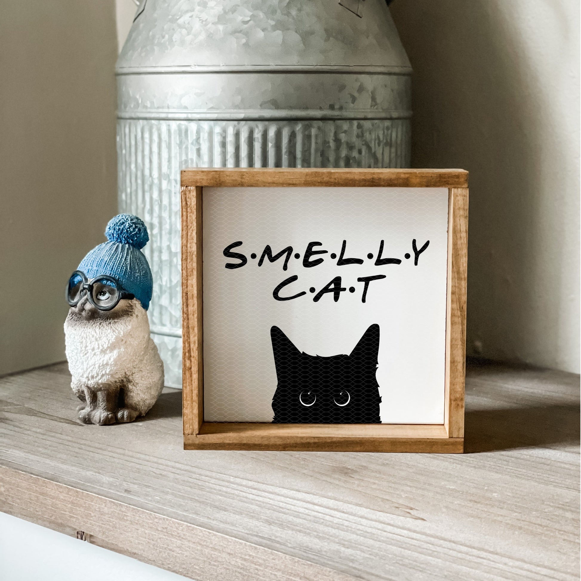 Smelly cat Friends sign.